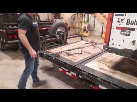 how to strap down a skid steer|how to chain down skid steer.